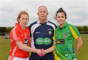 29 April 2012; Team captains Rhona Buckley, Cork, and Katie O'Brien, Meath, shake hands in the company of referee Keith Delahunty. Bord Gáis Energy Ladies National Football League, Division 1 Semi-Final, Cork v Meath, Crettyard, Co. Laois. Picture credit: Brian Lawless / SPORTSFILE