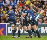 29 April 2012; Cian Healy, Leinster, is congratulated by team-mates Jamie Heaslip, left, and Shane Jennings on scoring their side's first try. Heineken Cup Semi-Final, ASM Clermont Auvergne v Leinster, Stade Chaban Delmas, Bordeaux, France. Picture credit: Stephen McCarthy / SPORTSFILE