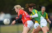 29 April 2012; Nollaig Cleary, Cork, in action against Aedin Murray, Meath. Bord Gáis Energy Ladies National Football League, Division 1 Semi-Final, Cork v Meath, Crettyard, Co. Laois. Picture credit: Brian Lawless / SPORTSFILE