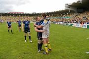 29 April 2012; Leinster's Sean O'Brien shares a moment with his old team-mate Nathan Hines, now of ASM Clermont Auvergne, after the game. Heineken Cup Semi-Final, ASM Clermont Auvergne v Leinster, Stade Chaban Delmas, Bordeaux, France. Picture credit: Stephen McCarthy / SPORTSFILE