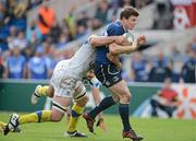 29 April 2012; Brian O'Driscoll, Leinster, is tackled by Jamie Cudmore, ASM Clermont Auvergne. Heineken Cup Semi-Final, ASM Clermont Auvergne v Leinster, Stade Chaban Delmas, Bordeaux, France. Picture credit: Brendan Moran / SPORTSFILE