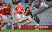 29 April 2012; Lee Keegan, Mayo, appears to trip as he runs past Cork's Pearse O'Neill. Allianz Football League, Division 1 Final, Cork v Mayo, Croke Park, Dublin. Picture credit: Ray McManus / SPORTSFILE
