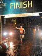 29 April 2012; Barry Minnoick, Rathfarnham WSAF A.C., approaches the line to win the Run Dublin @ Night. Dublin City, Co. Dublin. Picture credit: Tomas Greally / SPORTSFILE