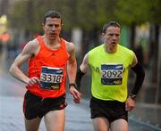 29 April 2012; The eventual winner Barry Minnock, 3318, leads eventual second place and his Rathfarnham WSAF A.C. club mate Sean Hehir down O'Connell Street on his way to winning Run Dublin @ Night. Dublin City, Co. Dublin. Picture credit: Tomas Greally / SPORTSFILE
