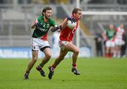29 April 2012; Patrick Kelly, Cork, in action against Kevin McLoughlin, Mayo. Allianz Football League, Division 1 Final, Cork v Mayo, Croke Park, Dublin. Picture credit: Oliver McVeigh / SPORTSFILE
