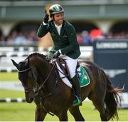 11 August 2017; Cian O'Connor of Ireland celebrates a clear first round on Good Luck during the FEI Nations Cup during the Dublin International Horse Show at RDS, Ballsbridge in Dublin. Photo by Cody Glenn/Sportsfile