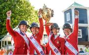 11 August 2017; Members of the winning USA team, from left, Lillie Keenan, Lauren Hough, Laura Kraut and Elizabeth Madden lift the Aga Khan following the FEI Nations Cup during the Dublin International Horse Show at RDS, Ballsbridge in Dublin. Photo by Cody Glenn/Sportsfile