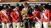 11 August 2017; The USA winning team of, from left, Laura Kraut, Lillie Keenan, Chef d'Equipe Robert Ridland, Lauren Hough and Elizabeth Madden with the Aga Khan Trophy after the FEI Nations Cup during the Dublin International Horse Show at RDS, Ballsbridge in Dublin. Photo by Piaras Ó Mídheach/Sportsfile