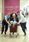 2 May 2012; Drogheda United manager Mick Cooke with players Derek Prendergast, left, Gabriel Sava, and Gavin Brennan, right, at the announcement of Scotch Hall Shopping Centre, Drogheda, as Drogheda United's main jersey sponsor. Scotch Hall Shopping Centre, Drogheda, Co. Louth. Photo by Sportsfile