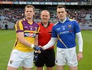 28 April 2012; Wexford captain David Murphy, left, and Longford captain Paul Barden, right, shake hands in front of referee Conor Lane. Allianz Football League, Division 3 Final, Longford v Wexford, Croke Park, Dublin. Picture credit: Ray McManus / SPORTSFILE