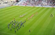 29 April 2012; The Mayo, left, and Cork teams behind the Artane School of Music Band for the traditional parade before the game. Allianz Football League, Division 1 Final, Cork v Mayo, Croke Park, Dublin. Picture credit: Ray McManus / SPORTSFILE
