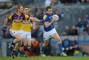 28 April 2012; Niall Mulligan, Longford, in action against Eric Bradley and Adrian Flynn, behind, Wexford. Allianz Football League, Division 3 Final, Longford v Wexford, Croke Park, Dublin. Picture credit: Ray McManus / SPORTSFILE