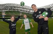 3 May 2012; Republic of Ireland stars Stephen Ward and Ciara Grant today launched the FAI eFlow Summer Soccer Schools programme for 2012. Due to the camps' increasing popularity, interested participants are encouraged to book early to avoid disappointment. Further information can be found at www.summersoccerschools.ie or by calling 1890653653. At the launch is Republic of Ireland star Stephen Ward, with Rachel Quinlivan, from Galway, and Chris Dolan, from Donegal. Aviva Stadium, Lansdowne Road, Dublin. Picture credit: Brian Lawless / SPORTSFILE
