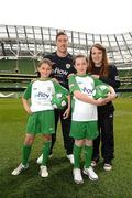 3 May 2012; Republic of Ireland stars Stephen Ward and Ciara Grant today launched the FAI eFlow Summer Soccer Schools programme for 2012. Due to the camps' increasing popularity, interested participants are encouraged to book early to avoid disappointment. Further information can be found at www.summersoccerschools.ie or by calling 1890653653. At the launch are Republic of Ireland stars Stephen Ward and Ciara Grant with stars of the future Chris Dolan and Shannon Cunningham, from Donegal. Aviva Stadium, Lansdowne Road, Dublin. Picture credit: Brian Lawless / SPORTSFILE