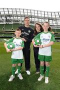 3 May 2012; Republic of Ireland stars Stephen Ward and Ciara Grant today launched the FAI eFlow Summer Soccer Schools programme for 2012. Due to the camps' increasing popularity, interested participants are encouraged to book early to avoid disappointment. Further information can be found at www.summersoccerschools.ie or by calling 1890653653. At the launch are Republic of Ireland stars Stephen Ward and Ciara Grant with stars of the future Connor Davis and Tara Bergin, from Meath. Aviva Stadium, Lansdowne Road, Dublin. Picture credit: Brian Lawless / SPORTSFILE
