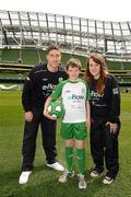 3 May 2012; Republic of Ireland stars Stephen Ward and Ciara Grant today launched the FAI eFlow Summer Soccer Schools programme for 2012. Due to the camps' increasing popularity, interested participants are encouraged to book early to avoid disappointment. Further information can be found at www.summersoccerschools.ie or by calling 1890653653. At the launch are Republic of Ireland star Stephen Ward and Ciara Grant with stars of the future Christopher Carew, from Laois. Aviva Stadium, Lansdowne Road, Dublin. Picture credit: Brian Lawless / SPORTSFILE
