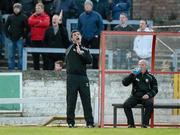 4 May 2012; Derry City manager Declan Devine, left, reacts on the sideline watched by his assistant Paul Hegarty. Airtricity League Premier Division, Derry City v St Patrick's Athletic, Brandywell, Derry. Picture credit: Oliver McVeigh / SPORTSFILE