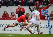 5 May 2012; Simon Zebo, Munster, goes over for his side's first try despite the attention of Paddy Jackson, Ulster. Celtic League, Munster v Ulster, Thomond Park, Limerick. Picture credit: Stephen McCarthy / SPORTSFILE