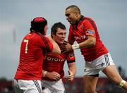 5 May 2012; Peter O'Mahony, Munster, centre, is congratulated by team-mates Tommy O'Donnell, left, and Simon Zebo after scoring his side's second try. Celtic League, Munster v Ulster, Thomond Park, Limerick. Picture credit: Stephen McCarthy / SPORTSFILE