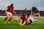 5 May 2012; Peter O'Mahony, Munster, with the support of team-mate Tommy O'Donnell, left, scores his side's second try despite the tackle of Adam D'Arcy, Ulster. Celtic League, Munster v Ulster, Thomond Park, Limerick. Picture credit: Stephen McCarthy / SPORTSFILE