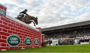 12 August 2017; Eventual co-winner Christopher Megahey of Ireland clears the Land Rover Puisance on Seapatrick Cruise Cavalier during the Dublin International Horse Show at RDS, Ballsbridge in Dublin. Photo by Cody Glenn/Sportsfile