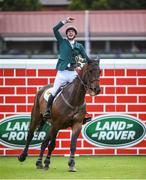 12 August 2017; Co-winner Daniel Coyle of Ireland celebrates clearing the Land Rover Puisance on Cavalier Rusticana during the Dublin International Horse Show at RDS, Ballsbridge in Dublin. Photo by Cody Glenn/Sportsfile