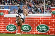 12 August 2017; Eventual co-winner Christopher Megahey of Ireland clears the obstacle on Seapatrick Cruise Cavalier in the Land Rover Puissance during the Dublin International Horse Show at RDS, Ballsbridge in Dublin. Photo by Cody Glenn/Sportsfile