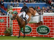 12 August 2017; Harriett Nuttall of Great Britain fails to clear the obstacle on Duff ìn the Land Rover Puissance during the Dublin International Horse Show at RDS, Ballsbridge in Dublin. Photo by Cody Glenn/Sportsfile