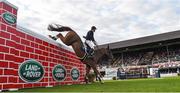 12 August 2017; Eventual co-winner Christpher Megahey of Ireland clearing the obstacle on Seapatrick Cruise Cavalier in the Land Rover Puissance during the Dublin International Horse Show at RDS, Ballsbridge in Dublin. Photo by Cody Glenn/Sportsfile