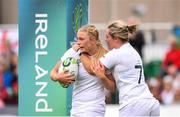 13 August 2017; Alex Matthews of England is congratulated by Marlie Packer, left, after scoring her sides second try during the 2017 Women's Rugby World Cup Pool B match between England and Italy at Billings Park in UCD, Dublin. Photo by Sam Barnes/Sportsfile