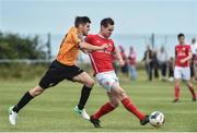 13 August 2017; Michael Barker of St Patrick's Athletic in action against  Conor Powell of Portmarnock FC during the Irish Daily Mail FAI Cup first round match between Portmarnock FC and St Patrick's Athletic at Paddy's Hill in Portmarnock, Dublin. Photo by David Maher/Sportsfile