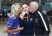 13 August 2017; Ireland team member Michaela Walsh, from Belfast, who won Gold, with her mother Martine and dad Damien after her return home with team Ireland from the European Union Elite Women’s Boxing Championships at Dublin Airport. Photo by Matt Browne/Sportsfile