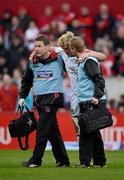 5 May 2012; Paddy McAllister, Ulster, leaves the pitch assisted by Ulster medical director Michael Webb, left, and Ulster head physiotherapist Gareth Robinson. Celtic League, Munster v Ulster, Thomond Park, Limerick. Picture credit: Stephen McCarthy / SPORTSFILE