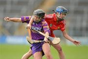 6 May 2012; Lisa Bolger, Wexford, in action against Jenny Duffy, Cork. National Camogie League, Division 1 Final, Cork v Wexford, Semple Stadium, Thurles, Co. Tipperary. Picture credit: Stephen McCarthy / SPORTSFILE