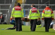 6 May 2012; Michael Fennelly, Kilkenny, is taken from the pitch after picking up an injury during the second half. Allianz Hurling League Division 1 Final, Kilkenny v Cork, Semple Stadium, Thurles, Co. Tipperary. Picture credit: Stephen McCarthy / SPORTSFILE