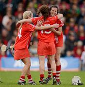 6 May 2012; Cork players, from left, Joanne O'Callaghan, Jennifer O'Leary and Orla Cotter celebrate their side's victory. National Camogie League, Division 1 Final, Cork v Wexford, Semple Stadium, Thurles, Co. Tipperary. Picture credit: Stephen McCarthy / SPORTSFILE