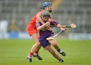 6 May 2012; Lisa Bolger, Wexford, in action against Jenny Duffy, Cork. National Camogie League, Division 1 Final, Cork v Wexford, Semple Stadium, Thurles, Co. Tipperary. Picture credit: Stephen McCarthy / SPORTSFILE