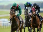 7 May 2012; Takar, with Johnny Murtagh up, on their way to winning the Dylan Thomas European Breeders Fund Tetrarch Stakes from eventual third place Triumphant, with Joseph O'Brien up, right, and eventual fourth place Janey Muddles, with Kevin Manning up. The Curragh Racecourse, The Curragh, Co. Kildare. Picture credit: Matt Browne / SPORTSFILE
