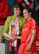 6 May 2012; President of the Camogie Association Aileen Lawlor presents the cup to Cork captain Julia White. National Camogie League, Division 1 Final, Cork v Wexford, Semple Stadium, Thurles, Co. Tipperary. Picture credit: Stephen McCarthy / SPORTSFILE