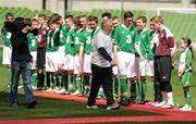7 May 2012; John Giles meets the teams ahead of the game. John Giles Foundation Dublin Walk of Dream match, DDSL, green, v NDSL/SDFL, white, Aviva Stadium, Lansdowne Road, Dublin. Picture credit: Stephen McCarthy / SPORTSFILE
