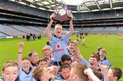 8 May 2012; Scoil Holy Trinity captain Conor Kelly is held shoulder high by his team-mates as he lifts the trophy after victory over Mary Mother of Hope. Allianz Cumann na mBunscol Finals, Scoil Holy Trinity v Mary Mother of Hope, Croke Park, Dublin. Picture credit: Ray McManus / SPORTSFILE