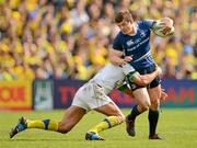 29 April 2012; Brian O'Driscoll, Leinster, is tackled by Regan King, ASM Clermont Auvergne. Heineken Cup Semi-Final, ASM Clermont Auvergne v Leinster, Stade Chaban Delmas, Bordeaux, France. Picture credit: Stephen McCarthy / SPORTSFILE