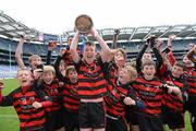 9 May 2012; St. Colmcille's S.N.S captain Ronan Wallace lifts the cup alongside his team-mates. Allianz Cumann na mBunscol Finals, St. Colmcille's S.N.S., Knocklyon v Scoil Mhuire, Marino, Croke Park, Dublin. Picture credit: Matt Browne / SPORTSFILE