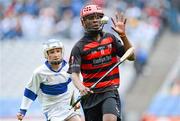 9 May 2012; Christian Tshibangu, St. Colmcille's S.N.S, in action against James O'Donnell, Scoil Mhuire. Allianz Cumann na mBunscol Finals, St. Colmcille's S.N.S., Knocklyon v Scoil Mhuire, Marino, Croke Park, Dublin. Picture credit: Matt Browne / SPORTSFILE