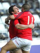 11 May 2012; Ian Keatley, Munster, is congratulated by team-mate Simon Zebo, right, after scoring his side's first try. Celtic League Play-Off, Ospreys v Munster, Liberty Stadium, Swansea, Wales. Picture credit: Steve Pope / SPORTSFILE