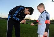 11 May 2012; Joshua Ryan, age 9, has his hurley signed by Dublin hurler Shane Stapleton during the Dublin GAA Open Day 2012. Fingallians GAA Club, Dublin. Picture credit: Stephen McCarthy / SPORTSFILE