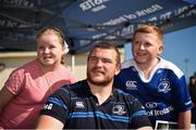 17 August 2017; Leinster's Jack McGrath pictured with twins Hannah Donnelann, left, and Cian Donnelann, both age 11, during the Bank of Ireland Leinster Rugby Summer Camp at Clontarf RFC in Castle Avenue, Clontarf, Dublin. Photo by Cody Glenn/Sportsfile