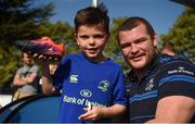 17 August 2017; Leinster's Jack McGrath pictured with Daniel Sweeney, age 8, after signing an autograph on his right boot during the Bank of Ireland Leinster Rugby Summer Camp at Clontarf RFC in Castle Avenue, Clontarf, Dublin. Photo by Cody Glenn/Sportsfile