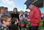 11 May 2012; Mayo manager James Horan signs autographs for young supporters during a Mayo GAA Open Day 2012. Elverys MacHale Park, Castlebar, Co Mayo. Picture credit: Barry Cregg / SPORTSFILE