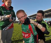 11 May 2012; Jamie Forry, aged 6, from Tuam, Co. Galway, gets his jersey signed by goalkeeper Robert Henley during a Mayo GAA Open Day 2012. Elverys MacHale Park, Castlebar, Co Mayo. Picture credit: Barry Cregg / SPORTSFILE